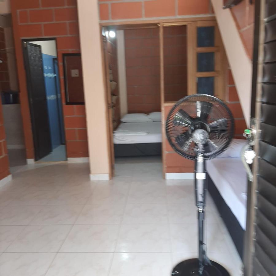 Mi Pueblo Natal Aptos Y Habitaciones Necoclí Esterno foto
